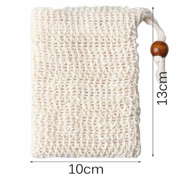 Beige crocheted sisal soap bag with wooden bead on drawstring, made from eco-friendly sisal fibres, dimensions 10 cm by 13.5 cm. (Jungle Culture)