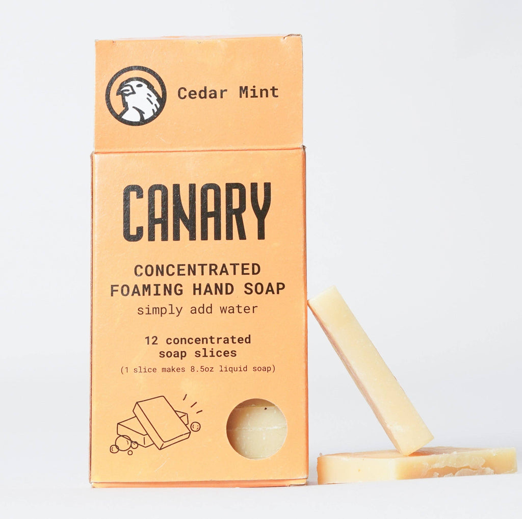 Packaging of Canary Clean Products - Cedar Mint Concentrated Hand Soap Refill Bar with one hand soap refill bar exposed next to the box.