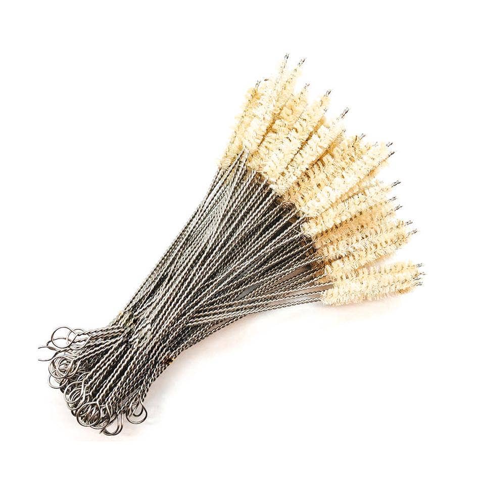 A bundle of Jungle Culture stainless steel straw cleaning brushes with cream-colored Grass Fibre bristles, fanned out against a white background.
