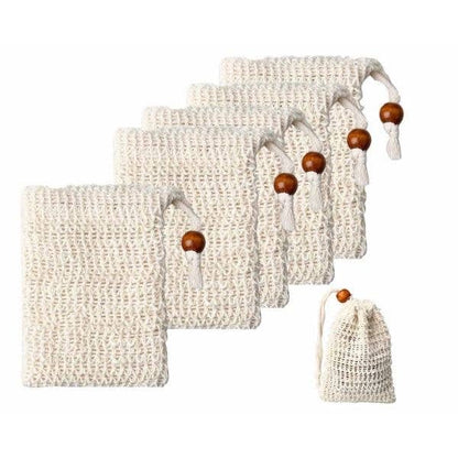 Set of eco-friendly beige Sisal Soap Bags made from sisal fibers with wooden beads on strings by Jungle Culture.